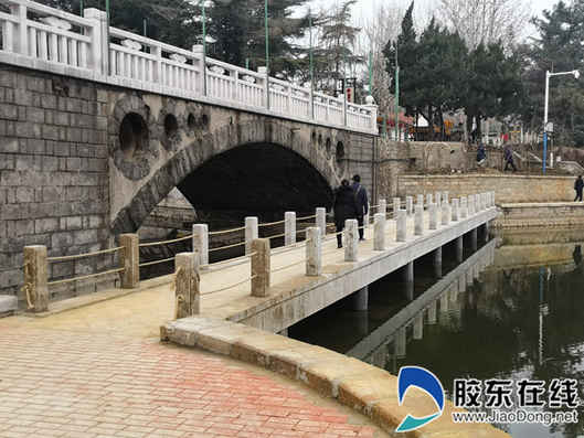 环湖观光增色更便民南山公园人工湖新桥建成